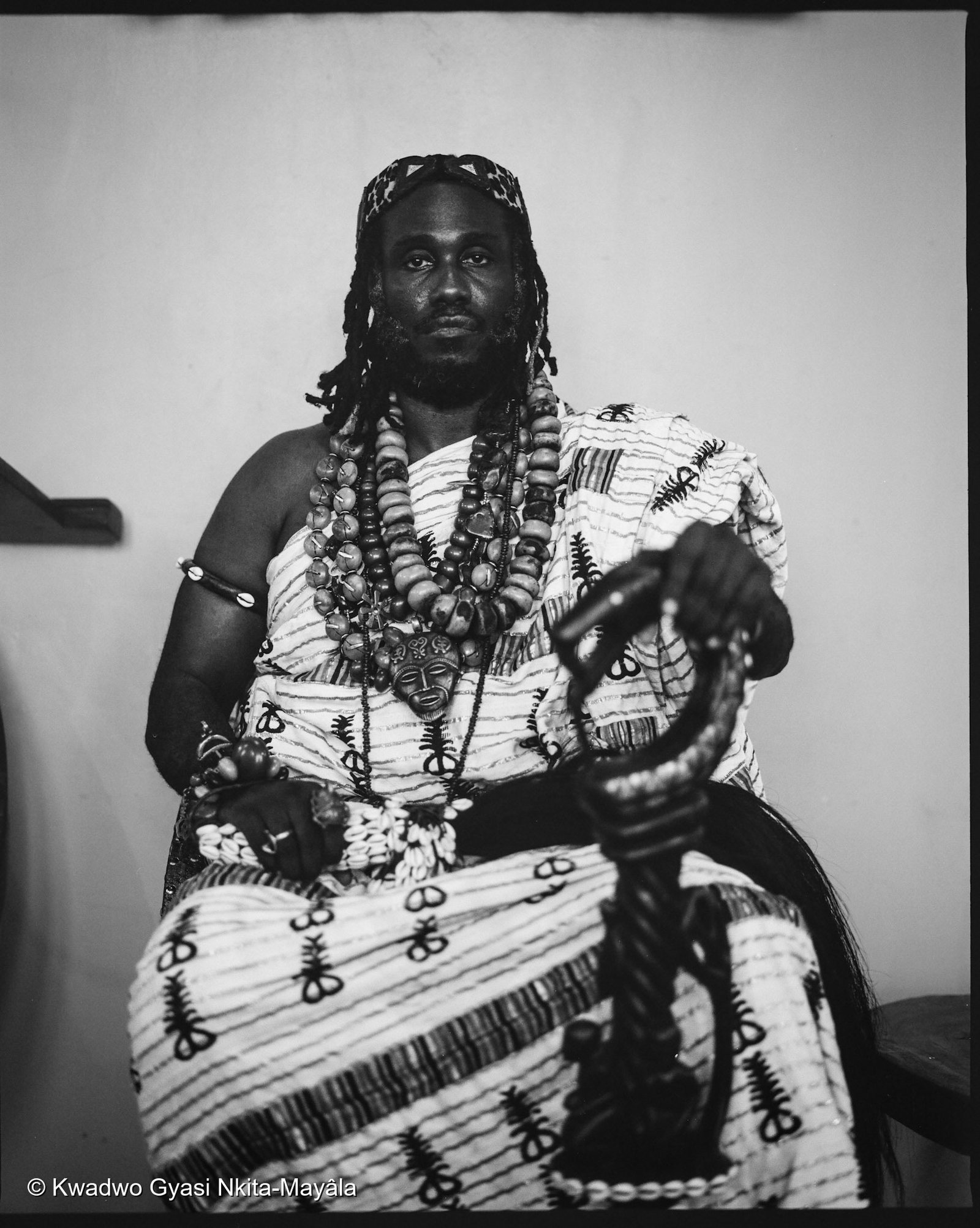 Ɔbenfo Ọbádélé Kambon speaking while seated